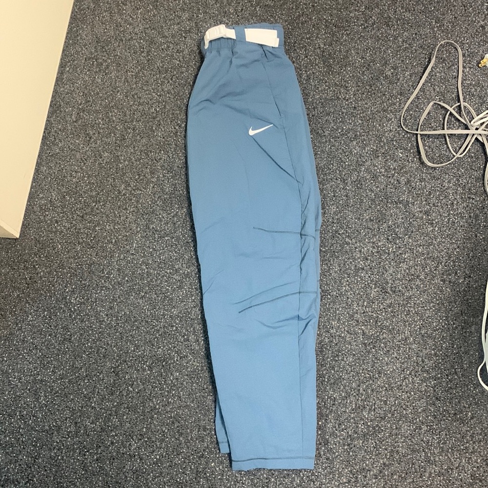 Women’s Nike Tech Pack Pants. Never worn. Tags still on.